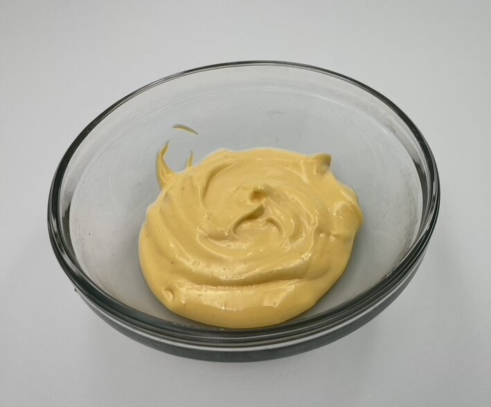 Mayonnaise in small glass bowl