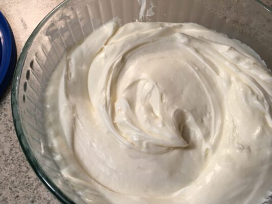 Glass bowl of Cream Cheese Frosting