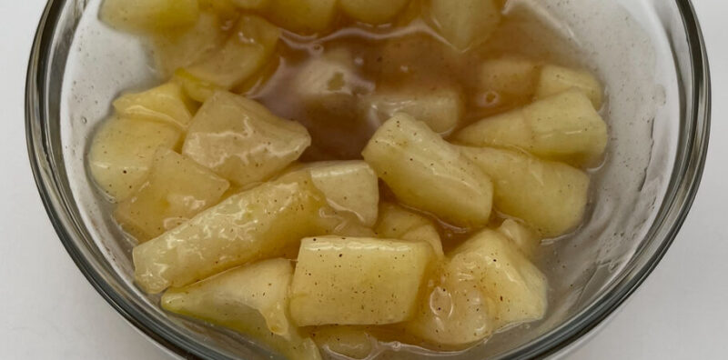 Apple Pie filling in bowl and spoon